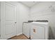 Laundry room featuring new appliances and shelving at 713 Chandler Stone Dr, Zebulon, NC 27597
