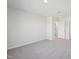 Spacious bedroom is shown with neutral walls and soft gray carpet at 715 Chandler Stone Dr, Zebulon, NC 27597