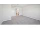 Comfortable bedroom with neutral walls and gray carpet at 715 Chandler Stone Dr, Zebulon, NC 27597