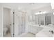 Spacious bathroom features double sinks, shower, and private toilet area at 802 Windermere Lake Ct, Apex, NC 27502