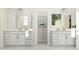 Bright bathroom featuring double vanities, modern fixtures, and clean design at 808 Emerald Bay Cir, Raleigh, NC 27610