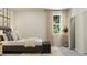 Inviting bedroom with a large window, comfortable bed, and minimalist decor at 808 Emerald Bay Cir, Raleigh, NC 27610