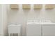 A well-equipped laundry room with ample storage and modern appliances at 808 Emerald Bay Cir, Raleigh, NC 27610