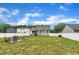 A spacious backyard features a fire pit and seating, ideal for relaxation and entertainment at 9 Little Sunshine Brk, Smithfield, NC 27577