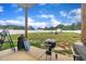 Spacious backyard featuring a patio, lush grass, and a privacy fence at 9 Little Sunshine Brk, Smithfield, NC 27577