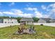 Spacious backyard featuring a fire pit and seating, perfect for outdoor gatherings at 9 Little Sunshine Brk, Smithfield, NC 27577