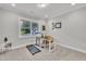 Bright room with a large window, neutral walls, carpet flooring, and an exercise machine at 9 Little Sunshine Brk, Smithfield, NC 27577