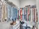 Well-organized closet featuring rods and shelves for clothing and shoe storage at 9 Little Sunshine Brk, Smithfield, NC 27577