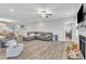 Spacious living room with fireplace and plenty of natural light and an open floor plan at 9 Little Sunshine Brk, Smithfield, NC 27577