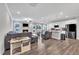 Open concept living area featuring eat in kitchen, stainless appliances and fireplace at 9 Little Sunshine Brk, Smithfield, NC 27577
