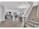 Open concept living area showcases stairs with baby gate, leading to a bright and inviting space at 9 Little Sunshine Brk, Smithfield, NC 27577
