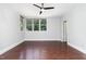 Spacious bedroom features a ceiling fan, and large windows for ample natural light at 90021 Hoey, Chapel Hill, NC 27517