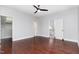 This spacious bedroom features hardwood floors and multiple doorways at 90021 Hoey, Chapel Hill, NC 27517
