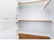 Walk-in closet with built in shelving and hanging rods at 90021 Hoey, Chapel Hill, NC 27517