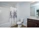 Bathroom with a shower-tub combo, single sink vanity, and neutral finishes at 905 Alice Ct, Haw River, NC 27258