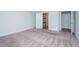Bedroom featuring carpet flooring and an open doorway to the bathroom at 905 Alice Ct, Haw River, NC 27258