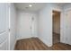 Bright entryway with hardwood floors, leading to other rooms in the home at 905 Alice Ct, Haw River, NC 27258