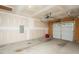 Spacious unfinished garage with ample room for parking and storage, awaiting customization and personalization at 905 Alice Ct, Haw River, NC 27258