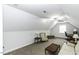 Large bonus room with a sitting area, an office area, neutral walls, and carpet floors at 9123 Thomas Rd, Rocky Mount, NC 27803
