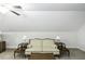 Bonus room featuring neutral walls, a floral sofa, coffee table, and lamps on end tables at 9123 Thomas Rd, Rocky Mount, NC 27803