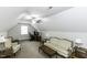 Open bonus room featuring neutral walls, a ceiling fan, and comfortable seating and workspace at 9123 Thomas Rd, Rocky Mount, NC 27803