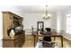 Elegant dining room with hardwood floors, chandelier, and traditional furniture at 9123 Thomas Rd, Rocky Mount, NC 27803