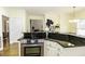 Modern kitchen showcasing granite countertops, stainless steel oven and white cabinets at 9123 Thomas Rd, Rocky Mount, NC 27803