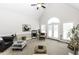 Spacious living room with a fireplace, vaulted ceiling, and stylish decor at 9123 Thomas Rd, Rocky Mount, NC 27803