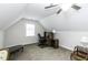 Neutral office area in the bonus room featuring a ceiling fan, desk, chair and window at 9123 Thomas Rd, Rocky Mount, NC 27803