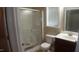 Standard bathroom featuring a shower with glass doors, toilet, and vanity with a sink at 919 Middle Ground Ave, Rolesville, NC 27571