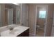 Bathroom with single sink vanity, toilet and a view to another room at 919 Middle Ground Ave, Rolesville, NC 27571