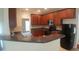Features stylish granite countertops and matching cabinetry with modern appliances at 919 Middle Ground Ave, Rolesville, NC 27571