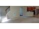 Open layout living room flows into kitchen and stairs to the second level at 919 Middle Ground Ave, Rolesville, NC 27571
