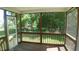 Screened-in porch with view of a lush green backyard; perfect for relaxing and entertaining at 919 Middle Ground Ave, Rolesville, NC 27571