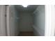Walk-in closet featuring built in shelves for optimal storage at 919 Middle Ground Ave, Rolesville, NC 27571