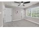 Bedroom with a ceiling fan, one window and gray carpet at 9639 Clubvalley Way, Raleigh, NC 27617