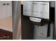 Close up of stainless steel refrigerator water and ice dispenser with settings panel at 9639 Clubvalley Way, Raleigh, NC 27617