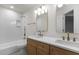 This bathroom has a double vanity and a separate toilet and shower area at 100 Citrus Pl, Cary, NC 27519