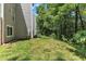 Backyard features lawn and mature trees at 101 Oyster Bay Ct # B2, Cary, NC 27513