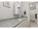 Bathroom features a modern vanity with countertop, white cabinetry and plenty of natural light at 101 Oyster Bay Ct # B2, Cary, NC 27513