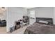 Bedroom with desk, computer, and a view into the living room at 101 Oyster Bay Ct # B2, Cary, NC 27513
