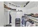 Walk-in closet featuring built-in shelving and hanging racks at 101 Oyster Bay Ct # B2, Cary, NC 27513