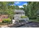Charming condo with wood bridges leading to a covered porch entry and second story balcony at 101 Oyster Bay Ct # B2, Cary, NC 27513