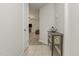 Inviting hallway leads to a spacious living area with modern flooring and neutral color palette at 101 Oyster Bay Ct # B2, Cary, NC 27513