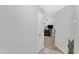 A neutral colored hallway looking to living room at 101 Oyster Bay Ct # B2, Cary, NC 27513