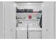 Laundry room with white appliances, shelving, and white paint at 101 Oyster Bay Ct # B2, Cary, NC 27513