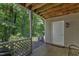 Covered patio area with view of wooded backyard at 101 Oyster Bay Ct # B2, Cary, NC 27513