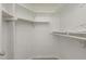 Functional walk-in closet provides ample storage space and organization at 101 Oyster Bay Ct # B2, Cary, NC 27513