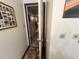 View through hallway with tile flooring and neutral-colored walls at 103 N Woods Rd, Henderson, NC 27536