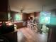 Kitchen with ample cabinets and a functional island with seating at 103 N Woods Rd, Henderson, NC 27536